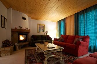 Meribel catered chalets 4 bedrooms - Chalet Quatre Miel lounge